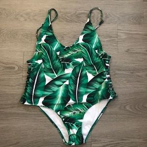 Leaf print swimsuit with side cut outs